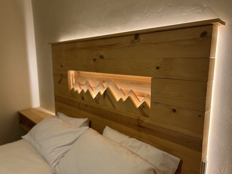 Custom LED mountain silhouette headboard detail