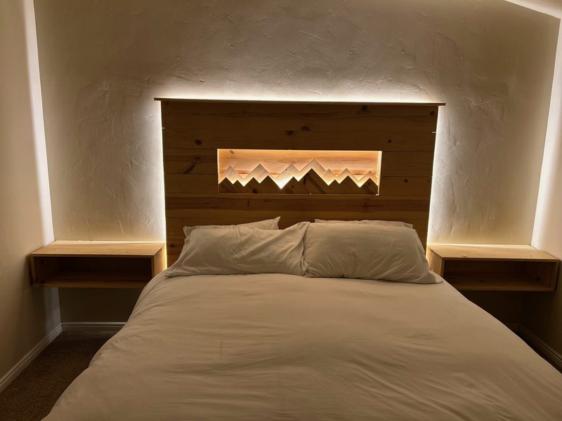 Master suite with custom LED headboard