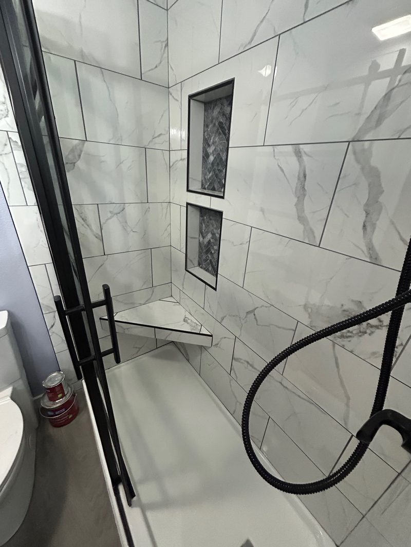 Marble shower with built-in niches